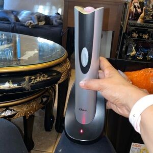 Bx47 Oster electric wine opener works fine